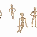 Group of wooden mannequins in various poses including standing and sitting