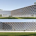 Modern Office Building Exterior Design With Multiple Balconies Glass Railings And Greenery