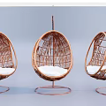 Rattan Oval Shaped Hanging Chairs With White Cushion And Metal Stand