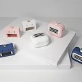 Colorful Cube Shaped Mini Speakers Pink White Blue On White Step Platform Light Grey Background