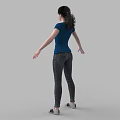 Woman in Blue T-shirt and Jeans Standing with Arms Outstretched on Gray Background