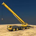 Yellow Crane Truck With Extended Boom Parked On Sandy Ground Under Blue Sky