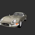Vintage Silver Classic Car With Round Headlights And Sleek Retro Body Design