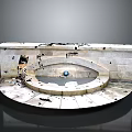 Weathered Stone Circular Basin Structure with Central Sphere and Scattered Cracked Fragments