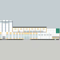 Modern Public Building With Glass Facade Stone Exterior Landscaping Water Feature And Entrance Steps
