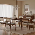 Modern Dining Room Interior With Wooden Table Woven Back Chairs Pendant Light And Sideboard
