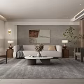 Modern Neutral Toned Living Room With Comfy Sofa And Round Marble Coffee Table And Tasteful Decor