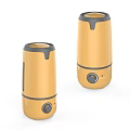 Yellow Humidifiers in Two Different Sizes with Modern Portable Design as Daily Use Electrical Appliances