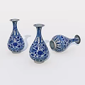 Three Blue and White Ceramic Vases With Traditional Ornate Floral Patterns