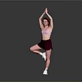 Woman Doing Yoga Single Leg Standing With Hands Raised In Pink Sports Bra Maroon Shorts