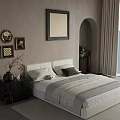 Serene Bedroom Interior With Beige Walls Black Framed Artwork White Bed And Green Plant