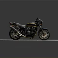 Black and Yellow Striped Motorcycle Parked on Gray Mat with Dark Background
