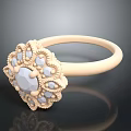 Elegant Vintage Gold Ring with Central Gemstone and Surrounding Small Stones Intricate Floral Design