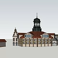 European Style Commercial Street With Red Brown Roofs White Walls And Tower Structures