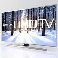 Samsung UHD TV Displaying Snowy Forest Scene With Sunlight And Snowy Trees
