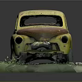 Weathered Yellow Car Model with Rust and Damaged Parts on Green Base