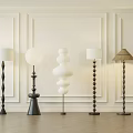 Various Design Floor Lamps With White Shades Spiral Bases And Decorative Paneled Walls