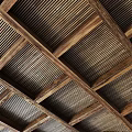 Wooden Ceiling With Beams And Slatted Panels