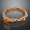 Elegant Golden Bracelet With Intertwined Chain Design And Decorative Gemstone