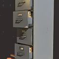 Gray Metal Filing Cabinet With Multiple Drawers Books On Top And Side Card