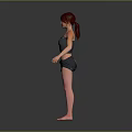 Woman With Red Hair In Strapless Top And Shorts Standing Barefoot On Gray Background