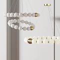 Elegant White Gold Beaded Chandelier With Spiral Ring Design For Modern Interior