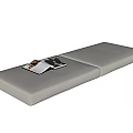Modern Bay Window Cushion With Grey Fabric And Magazine On Top