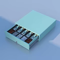 Light Blue Storage Box With Drawer Holding Spice Packets And Granules