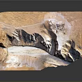 Majestic Rocky Mountain Landscape With Deep Canyon And Ancient Structures In Terrain