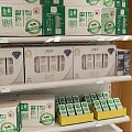 Well Organized Retail Display Shelves With Multi tiered Racks Holding Packaged Cereals Canned Goods And Boxed Products