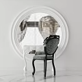 Modern White Vanity With Round Mirror And Black Chair On Marble Floor
