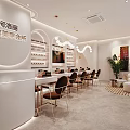 Elegant Modern Beauty Salon Interior With Massage Beds White Sheets And Green Plant