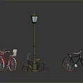 Colorful Vintage Bicycles Parked Near Classic Street Lamp In Dark Setting