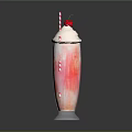 Colorful Layered Milkshake In Tall Glass Topped With Whipped Cream Cherry And Striped Straw