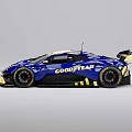 Blue And Yellow Monster Race Car With Aerodynamic Design And Rear Wing