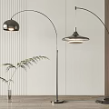 Modern Floor Lamps With Curved Metal Stands And Different Shade Designs In Interior