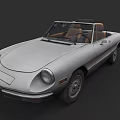 Vintage Silver Open Top Convertible Car With Brown Interior And Classic Design