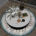 Round Glass Top Coffee Table With Fresh Flowers Green Plants Decorative Tray Nuts And Teacup