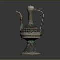 Antique Bronze Household Ewer With Decorative Spout Handle And Intricate Base Design