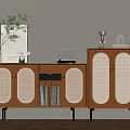 Wooden Cabinet With Rattan Doors Books And Decorative Items On Top