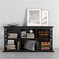 Black Open Bookcase With X Shaped Shelves Photo Frames Stacked Books Decorative Sphere And Throw Pillow