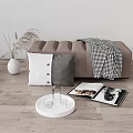 Cozy Footstool With Checkered Blanket Pillows Dried Grass Vase And Magazines In Living Room