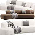 White and Brown Upholstered Double Sofa with Striped Throw Blanket and Gray Pillows