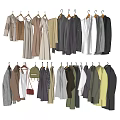 Clothes Hanging On Hangers With Various Styles Assorted Colors And Red Bag
