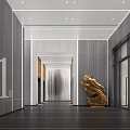 Modern Reception Area Lobby With Gold Sculpture Recessed Lighting And Glass Doors