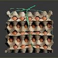 Stacked Paper Egg Cartons Tied With Green String Containing Brown Eggs
