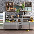 Functional Stainless Steel Table In Modern Kitchen With Storage Appliances And Plants