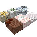 Assorted Gift Boxes Featuring Colorful Patterns And Decorative Ribbon Bows