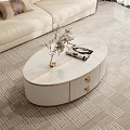 Elegant Modern Oval Coffee Table With White Marble Top Gold Accents And Decorative Vase Magazine