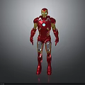 Iron Man Red And Gold Figure Standing With Blue Chest Energy Core On Gray Background